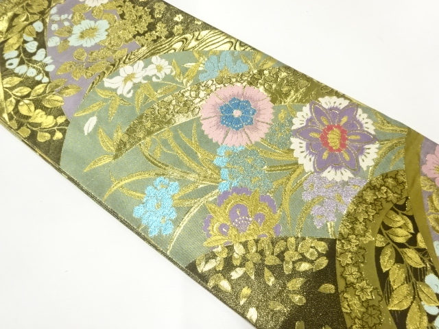 本金唐花模様織出し丸帯